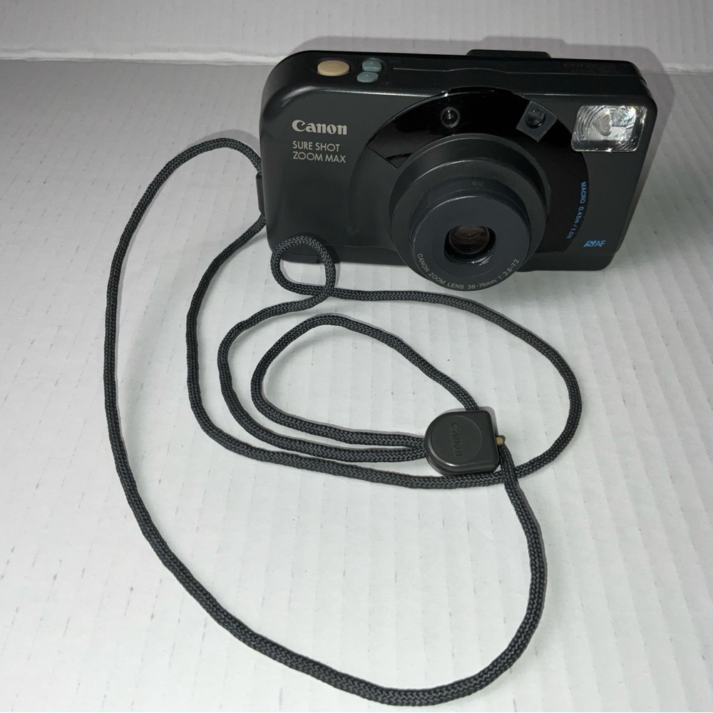 Canon Sure Shot Zoom Max 35mm Film Point & Shoot Camera TURNS ON FLASH,UNTESTED
